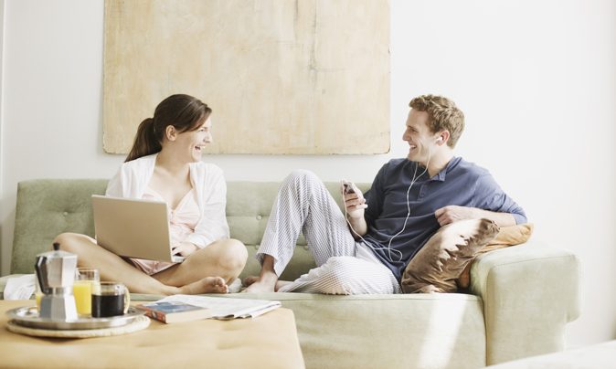 smiling couple in living room